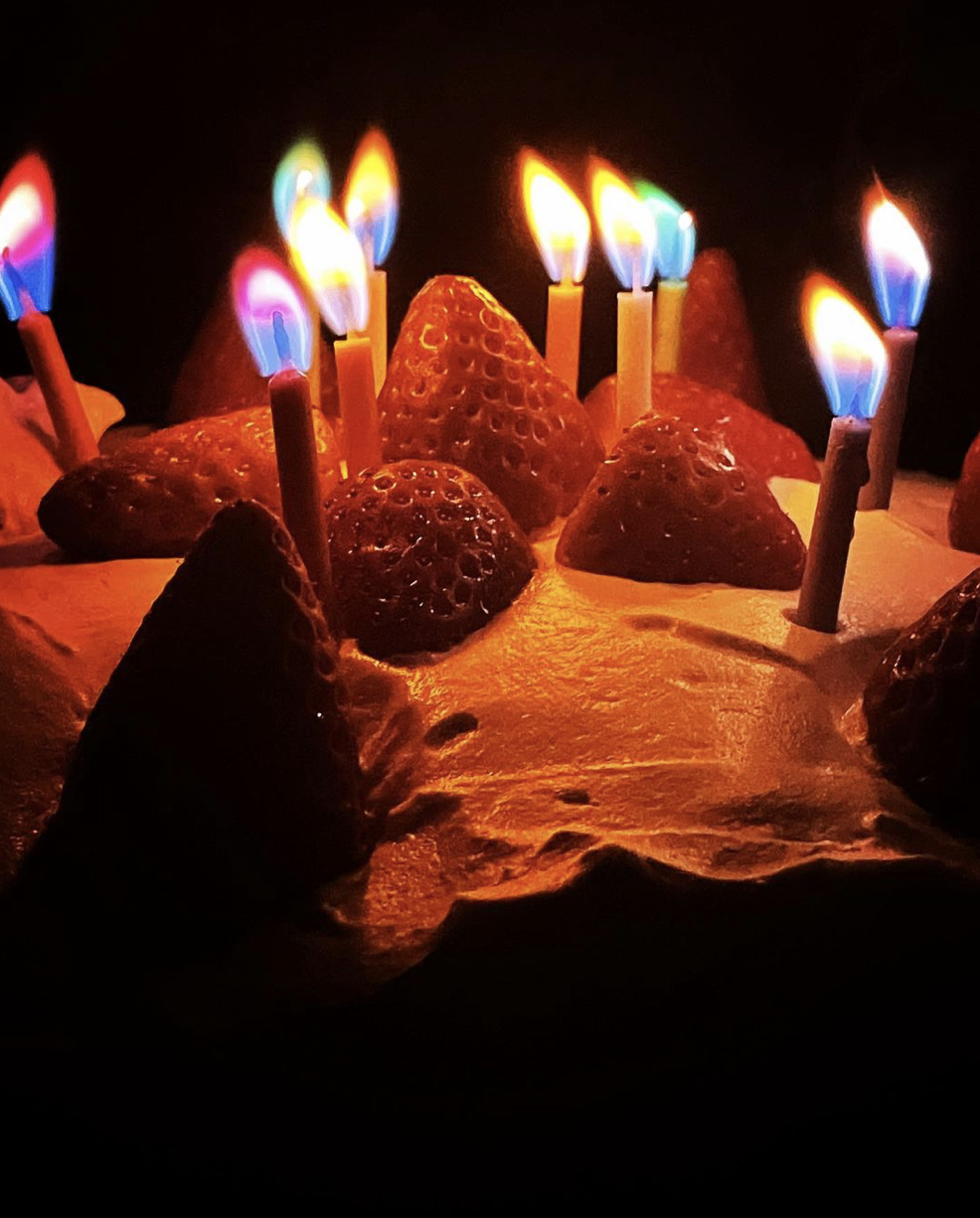 An upclose picture of a birthday cake